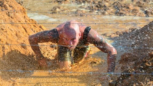 Veteran and Spartan course designer Dylan Forsyth competes in a race.