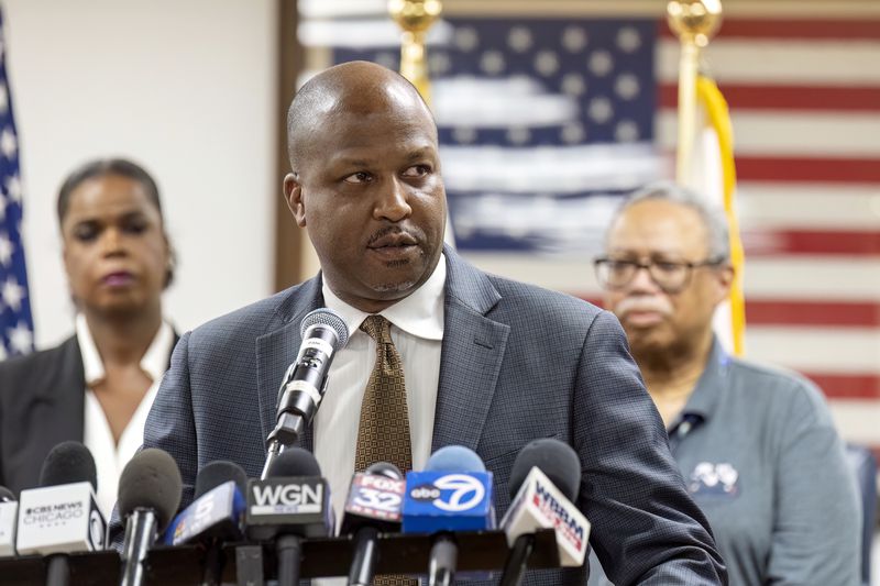 Forest Park Mayor Rory Hoskins speaks to reporters at the Forest Park Village Hall over the shooting death of four people on a Chicago-area transit Blue Line train yesterday morning, Tuesday, Sept. 3, 2024, in Forest Park, Ill. (Tyler Pasciak LaRiviere/Chicago Sun-Times via AP)