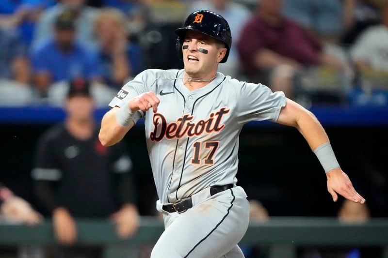 Detroit Tigers' Jace Jung runs home to score on a double by Trey Sweeney during the third inning of a baseball game against the Kansas City Royals Wednesday, Sept. 18, 2024, in Kansas City, Mo. (AP Photo/Charlie Riedel)