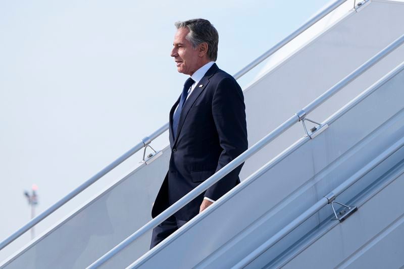 U.S. Secretary of State, Antony Blinken waves as he arrives at Chopin Airport in Warsaw, Poland, Thursday, Sept. 12, 2024. (AP Photo/Mark Schiefelbein, Pool)