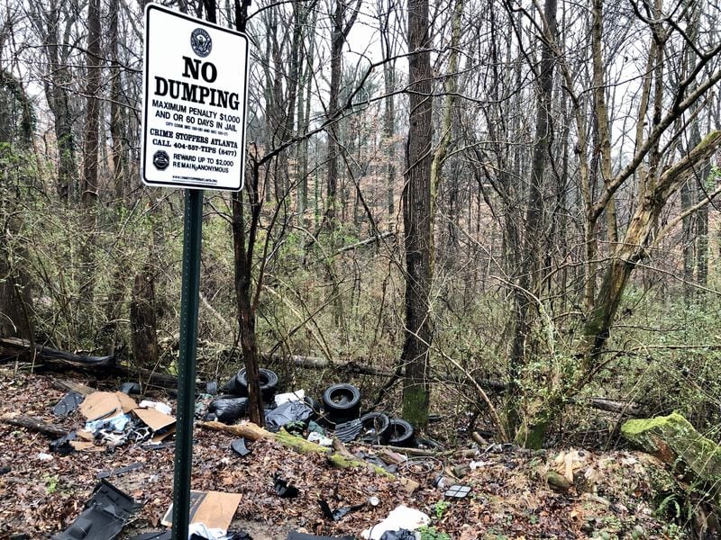 Tires and other junk have been dumped in a lot in the Carey Park neighborhood west of Midtown Atlanta. Two well-known players in Atlanta real estate planned a sweeping redevelopment in the neighborhood and others west of Midtown Atlanta. Those two speculators, Brock Built Homes President Steve Brock, and broker Gregory Todey are now gripped in a legal battle with Brock claiming Todey defrauded him of his interests in distressed land near the future Westside Park at Bellwood Quarry. J. SCOTT TRUBEY/SCOTT.TRUBEY@AJC.COM