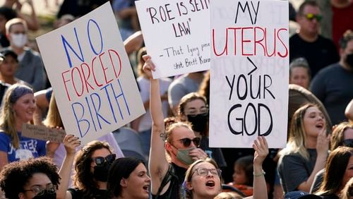 FILE - Abortion-rights protesters attend a rally, June 24, 2022, in Des Moines, Iowa. Iowa’s strict abortion law will take effect Monday, July 29, 2024, banning most abortions after about six weeks of pregnancy and before many women know they are pregnant. (AP Photo/Charlie Neibergall, File)