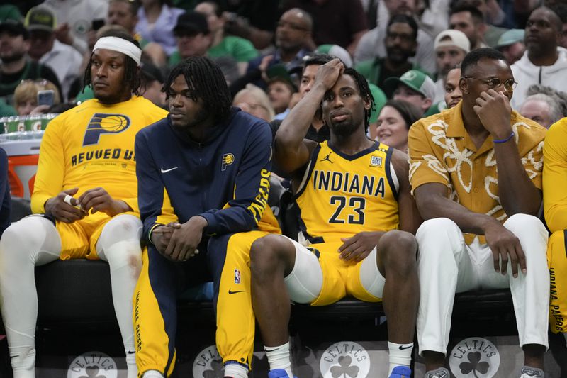 Members of the Indiana Pacers sit on the bench during the second half of Game 2 of the NBA Eastern Conference basketball finals against the Boston Celtics, Thursday, May 23, 2024, in Boston. (AP Photo/Steven Senne)