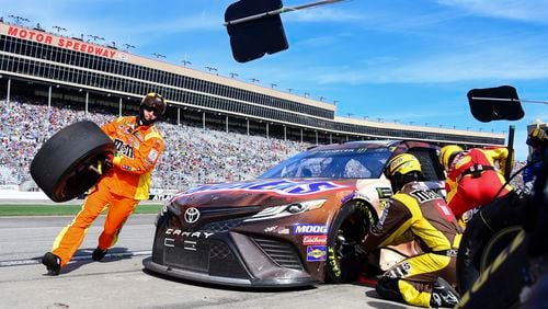 Minus all the fans in the background, racing is scheduled to resume this weekend at Atlanta Motor Speedway. (AP Photo/Scott Cunningham)