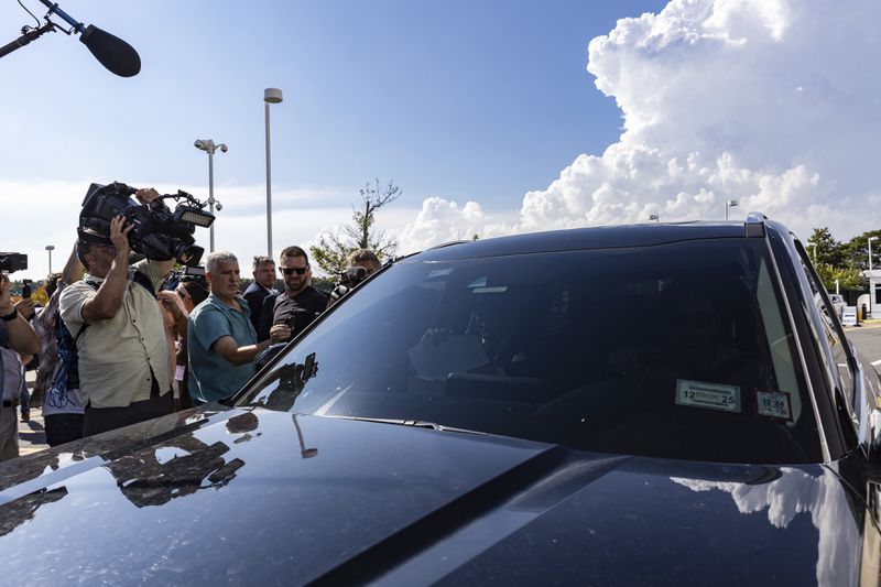 Former U.S. Rep George Santos leaving the federal courthouse in Central Islip, N.Y. on, Monday, Aug. 19, 2024 in New York. (AP Photo/Stefan Jeremiah)