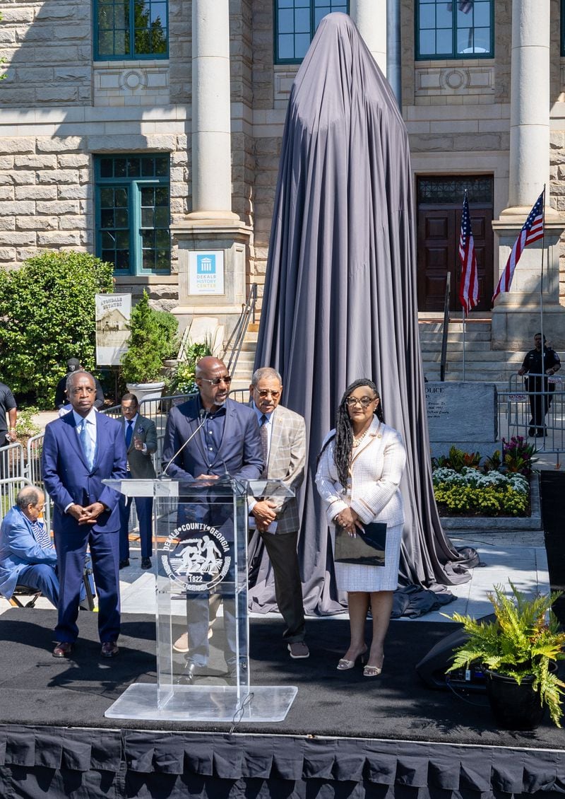 Senator Raphael Warnock speaks during the statue unveiling ceremony honoring the late Congressman John Lewis in Decatur on Saturday, Aug 24, 2024. (Steve Schaefer / AJC)