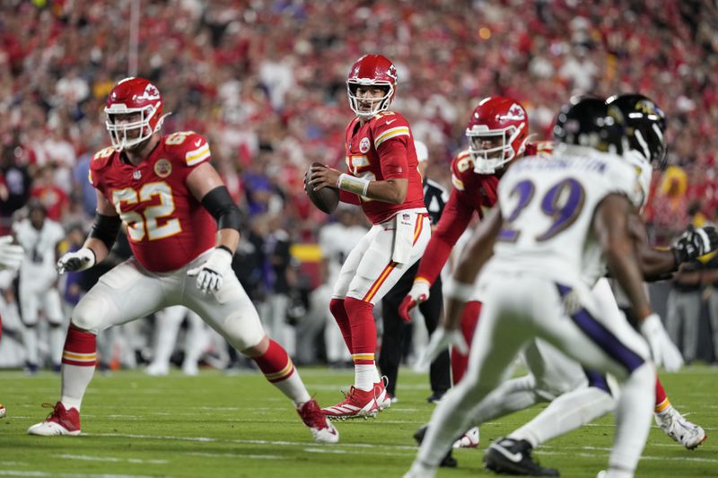 Kansas City Chiefs quarterback Patrick Mahomes drops back to pass during the first half of an NFL football game against the Baltimore Ravens Thursday, Sept. 5, 2024, in Kansas City, Mo. (AP Photo/Ed Zurga)