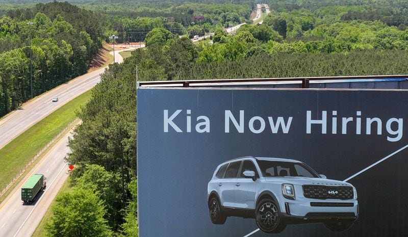 May 11, 2022 West Point - Kia’s hiring billboard is displayed along I-85 in West Point on Wednesday, May 11, 2022. Georgia is poised to announce its second electric vehicle plant, a massive assembly complex by Hyundai Motor Group, that could bring with it 8,500 jobs to a site near Savannah, people familiar with the matter have told The Atlanta Journal-Constitution. (Hyosub Shin / Hyosub.Shin@ajc.com)