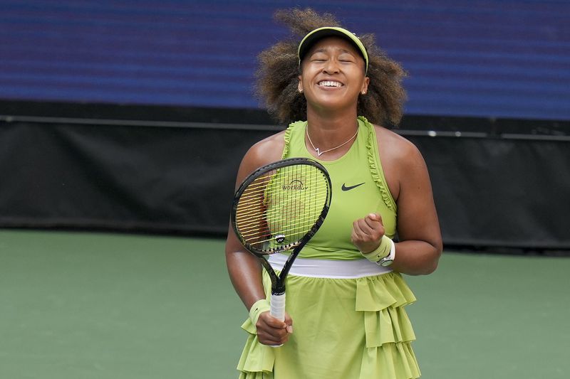 Naomi Osaka, of Japan, reacts after defeating Jelena Ostapenko, of Latvia, during the first round of the U.S. Open tennis championships, Tuesday, Aug. 27, 2024, in New York. (AP Photo/Seth Wenig)