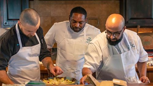 Chef Zouhair Bellout (right) of Reynolds Lake Oconee believes that "an atmosphere of ideas builds confidence." Courtesy of Reynolds Lake Oconee