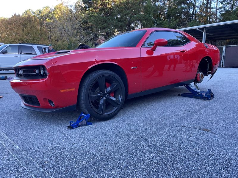 A red Dodge Challenger was impounded after Atlanta police made several street racing arrests over the weekend.
