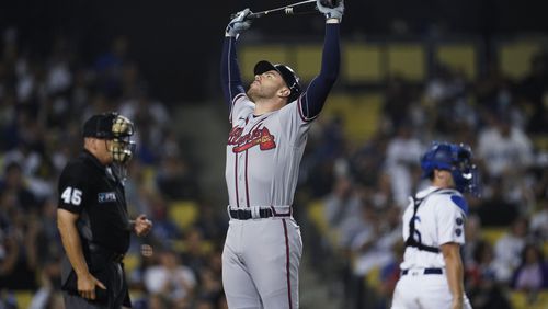 Atlanta Braves' Freddie Freeman reacts after striking out during the eighth inning of the team's baseball game against the Los Angeles Dodgers on Tuesday, Aug. 31, 2021, in Los Angeles. (AP Photo/Marcio Jose Sanchez)