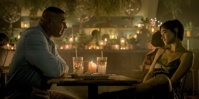 This cover image released by Lionsgate shows Dave Bautista, left, and Sofia Boutella in a scene from "The Killer's Game." (Lionsgate via AP)