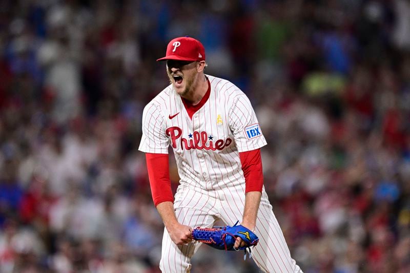 Philadelphia Phillies' Jeff Hoffman reacts after striking out Atlanta Braves' Marcell Ozuna during the eighth inning of a baseball game, Sunday, Sept. 1, 2024, in Philadelphia. (AP Photo/Derik Hamilton)