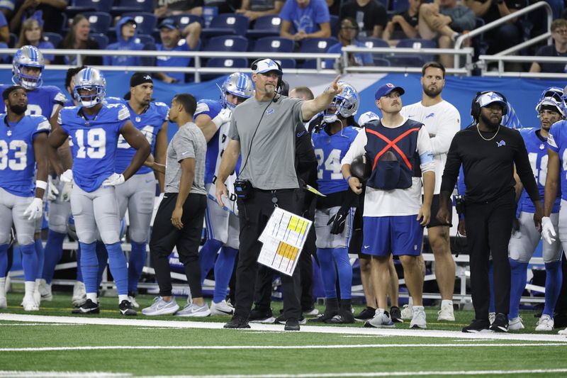 Detroit Lions head coach Dan Campbell signals during the second half of an NFL preseason football game against the Pittsburgh Steelers, Saturday, Aug. 24, 2024, in Detroit. (AP Photo/Duane Burleson)