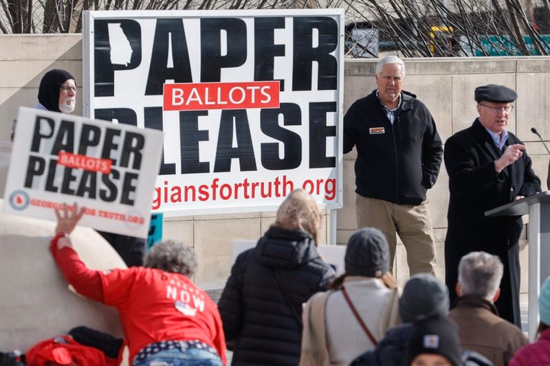 Supporters of paper ballots gathered Monday to protest in Liberty Plaza outside the Georgia Capitol. (Natrice Miller/ Natrice.miller@ajc.com)