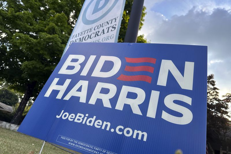 A sign for Democratic President Joe Bide. stands outside the Fayette County Democratic headquarters, Monday, June 17, 2024, in Fayetteville, Ga. Democratic President Joe Biden and former Republican President Donald Trump are working to win over Georgia voters ahead of the pair's first 2024 debate scheduled for Thursday, June 27, in Atlanta. (AP Photo/Jeff Amy)