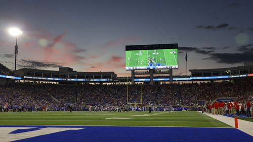 The sun sets as Kentucky plays offense against Georgia during the first half at Kroger Field, Saturday, Sept. 14, 2024, in Lexington, Kentucky. Georgia won 13-12. (Jason Getz / AJC)

