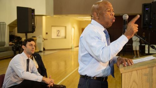 U.S. Rep. John Lewis talks to the crowd as Senate candidate Jon Ossoff looks on during a  voter registration rally at the MLK Recreation Center in Atlanta on Saturday, September 28, 2019. (Photo: STEVE SCHAEFER / SPECIAL TO THE AJC)