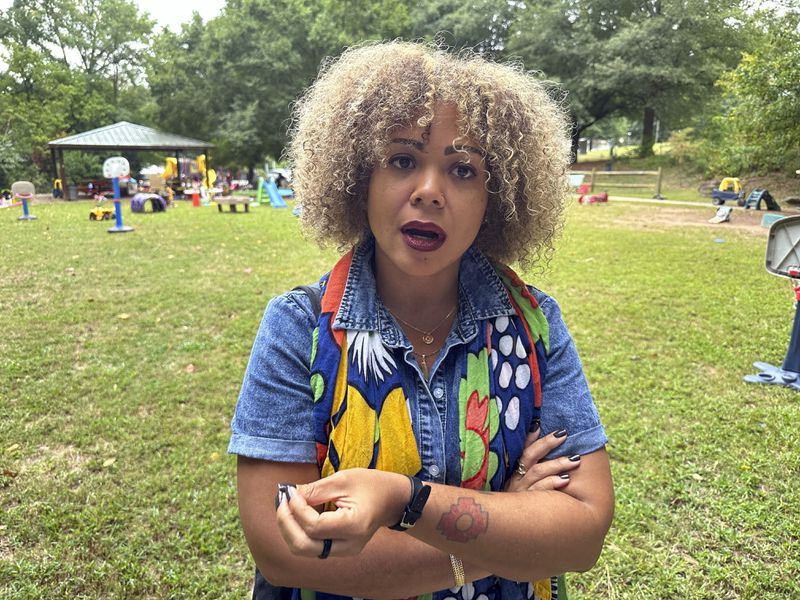 Claudia De la Cruz, the Party for Socialism and Liberation's 2024 presidential nominee, speaks during an interview on Friday, Sept. 13, 2024, in a park in Decatur, Ga. (AP Photo/Jeff Amy)