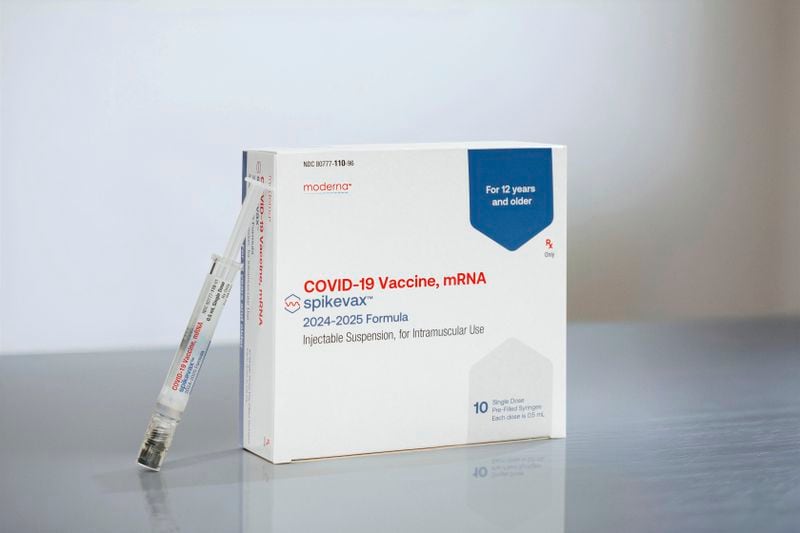 This photo provided by Moderna in August 2024 shows packaging and a syringe for the company's updated COVID vaccine for ages 12 and older approved by the U.S. Food and Drug Administration on Thursday, Aug. 22, 2024. (Moderna via AP)