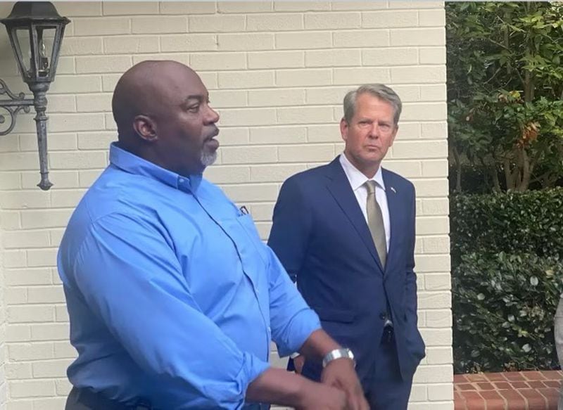 Georgia Gov. Brian Kemp, right, campaigns in August in support of Republican Mark Robinson's bid for governor of North Carolina. An aide said Monday that Kemp “attended the fundraiser (for Robinson) as vice chair of the Republican Governors Association and will not be offering further support to the Robinson campaign.” 