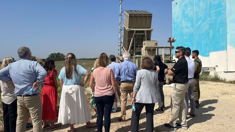 An Israeli soldier briefs Georgia Gov. Brian Kemp and members of the Georgia delegation on Israel's antimissile Iron Dome system. (Courtesy Gov. Brian Kemp's office/TNS)
