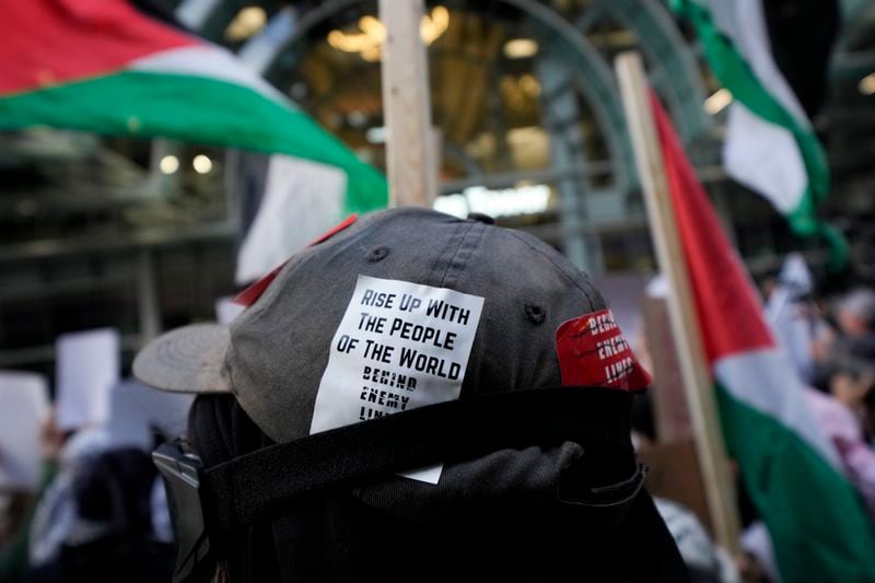 Protesters demonstrate near the Israeli Consulate during the Democratic National Convention Tuesday, Aug. 20, 2024, in Chicago. (AP Photo/Julio Cortez)