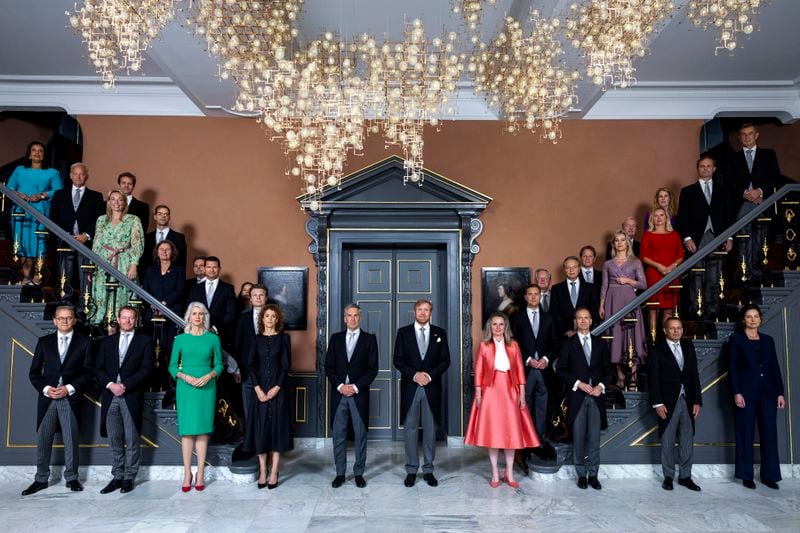 Dutch King Willem-Alexander, center right, Prime Minister Dick Schoof, center left, ministers and deputy ministers of the new Dutch government pose for a group picture at royal palace Huis ten Bosch in The Hague, Netherlands, Tuesday, July 2, 2024. (Remko de Waal/Pool Photo via AP)