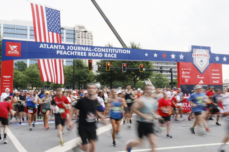 Runners take off at the start of the 54th running of the Atlanta Journal-Constitution Peachtree Road Race in Atlanta on Tuesday, July 4, 2023.


Miguel Martinez /miguel.martinezjimenez@ajc.com