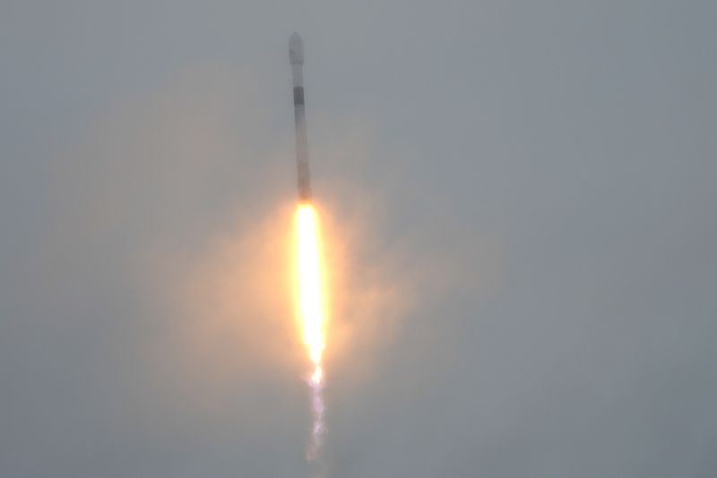 A SpaceX Falcon 9 rocket goes into clouds as it lifts off from the Cape Canaveral Space Force Station, Monday, Oct. 7, 2024 at Cape Canaveral, Fla., carrying a European spacecraft to an asteroid. (AP Photo/John Raoux)