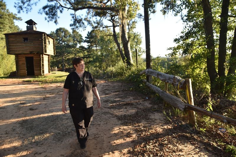 Dr. Karen Kinsell, seen here in 2017, runs an urgent care clinic in Clay County and only recently got COVID. She says that six weeks later, she is still on oxygen, some days around the clock, and that fatigue has forced her to do mostly virtual visits from home. (HYOSUB SHIN / HSHIN@AJC.COM)