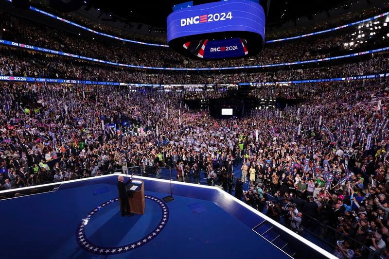 President Joe Biden waves to the crowd during the Democratic National Convention, Monday, Aug. 19, 2024, in Chicago. (Mike Segar/Pool Photo via AP)