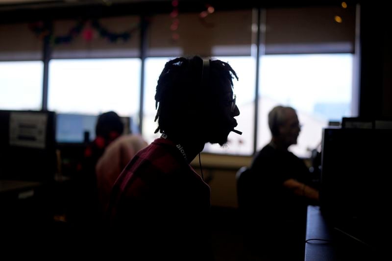 Customer Experience Representative Rico Thomas takes calls at an Alorica center, Monday, Aug. 19, 2024, in San Antonio. (AP Photo/Eric Gay)