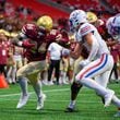 Brayden Tyson, running back for Brookwood HS, runs the ball to the goal line during the Corky Kell Classic at Mercedes Benz Stadium in Atlanta, GA on August 17, 2024. (Jamie Spaar for the Atlanta Journal Constitution)