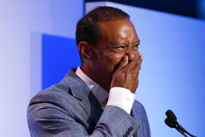 Tiger Woods becomes emotional during his induction into the World Golf Hall of Fame Wednesday, March 9, 2022, in Ponte Vedra Beach, Fla. (AP Photo/Gerald Herbert)