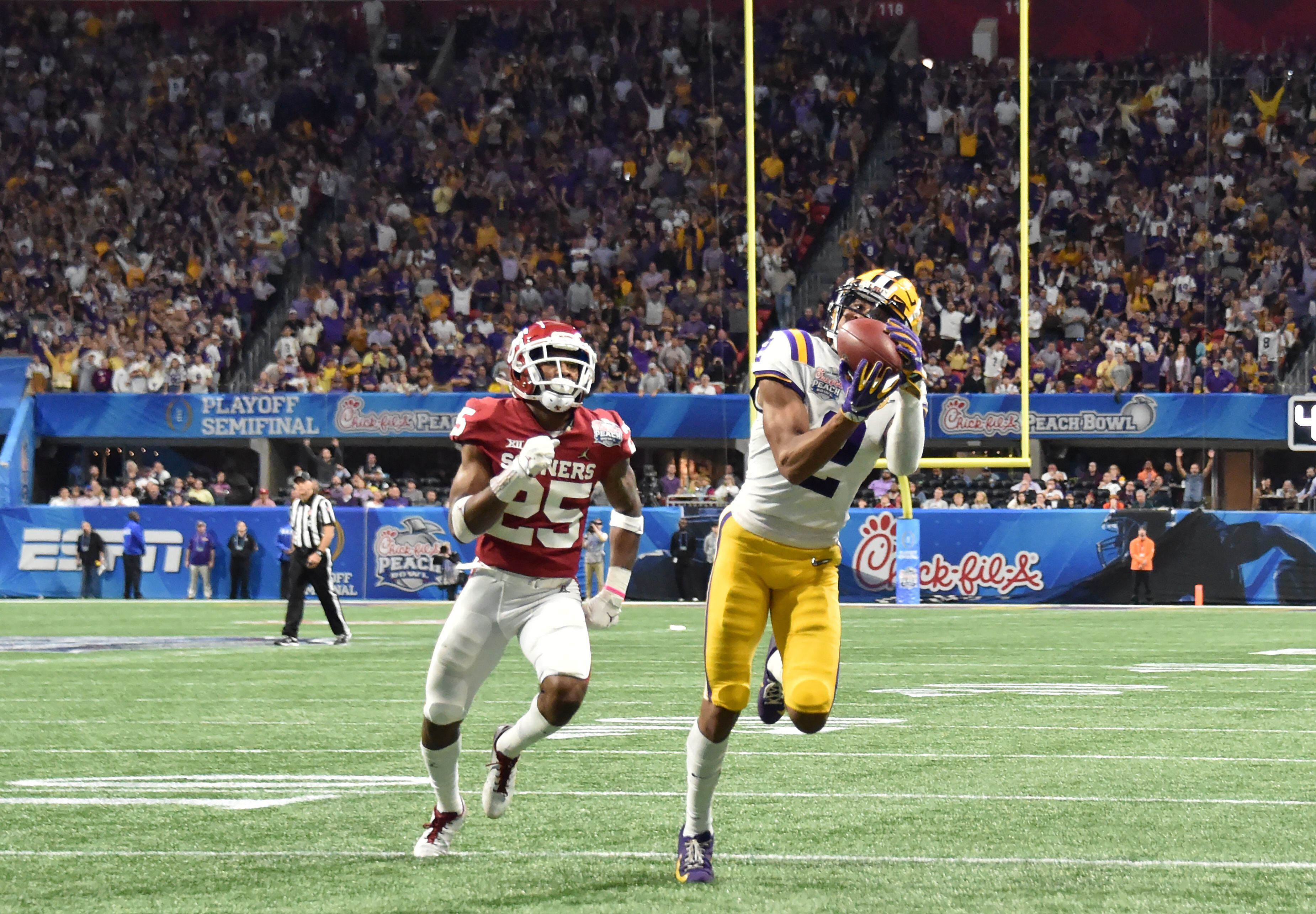 LSU beats Oklakhome, 63-28 in Peach Bowl semifinal game