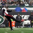 Atlanta Falcons punter Bradley Pinion (13) in action against the New York Jets during an NFL football game Sunday, Dec. 3, 2023, in East Rutherford, N.J. (AP Photo/Adam Hunger)