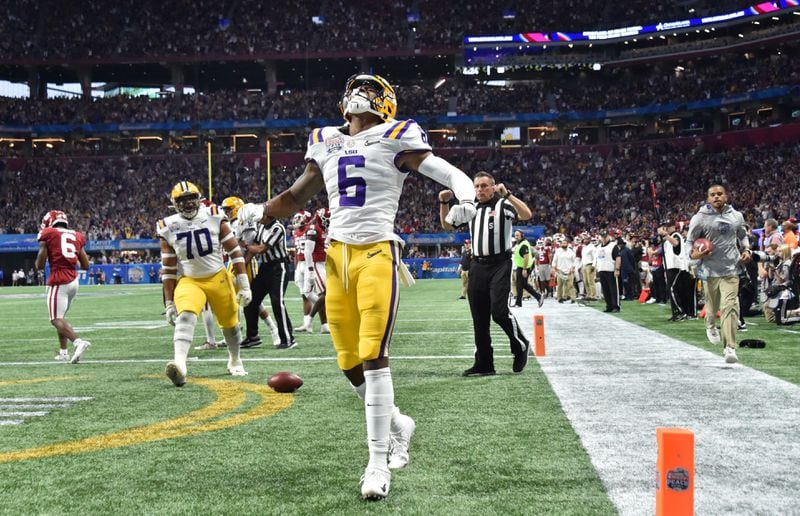 LSU wide receiver Terrace Marshall Jr. (6) reacts after he scored a touchdown in the first half of the Chick-fil-A Peach Bowl at Mercedes-Benz Stadium on Saturday, December 28, 2019. (Hyosub Shin / Hyosub.Shin@ajc.com)