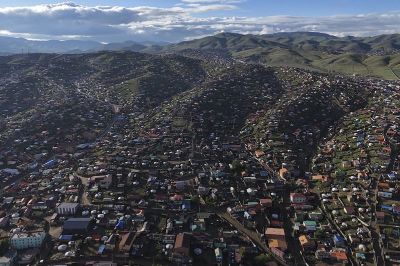 A view from a drone over the Ger District on the outskirts of Ulaanbaatar, Mongolia, Thursday, June 27, 2024. Parliamentary elections are being held Friday in this sparsely populated and landlocked Asian nation, known for its bitter winter cold and independent spirit. (AP Photo/Ng Han Guan)