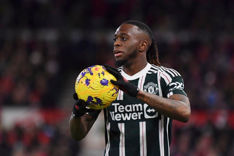 FILE -Manchester United's Aaron Wan-Bissaka holds the ball during the English Premier League soccer match between Nottingham Forest and Manchester United at City Ground in Nottingham, England, Saturday, Dec. 30, 2023. (AP Photo/Rui Vieira, File)