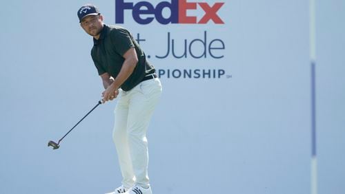 Xander Schauffele watches his putt on the 17th green during the final round of the St. Jude Championship golf tournament Sunday, Aug. 18, 2024, in Memphis, Tenn. (AP Photo/Mark Humphrey)