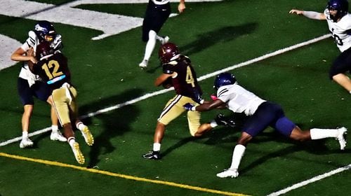 Izayah Horsham (No. 4)  completes his touchdown run in a 47-6 win over Northview, Sept. 25, 2024.