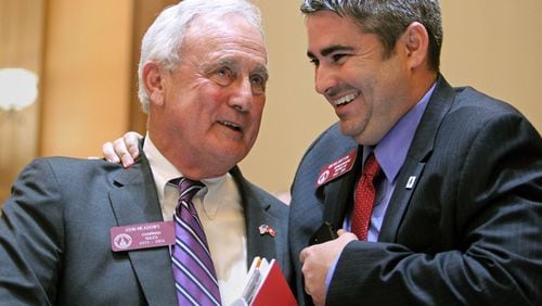 March 28, 2013 - Atlanta, Ga: House Rules Chairman John Meadows, R-Calhoun, left, and Rep. Delvis Dutton, R-Glennville, say goodbye minutes before, "Sine Die," at the end of Legislative Day 40 in the House Chambers at the Capitol Thursday night in Atlanta, Ga., March 28, 2013. Thursday is the last day of the 2013 Legislative Session, Legislative Day 40. JASON GETZ / JGETZ@AJC.COM