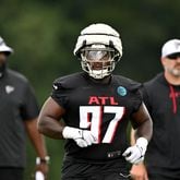 Defensive lineman Grady Jarrett (97) is back on the field for the Falcons during the first practice of training camp Thursday in Flowery Branch. (Hyosub Shin / AJC)