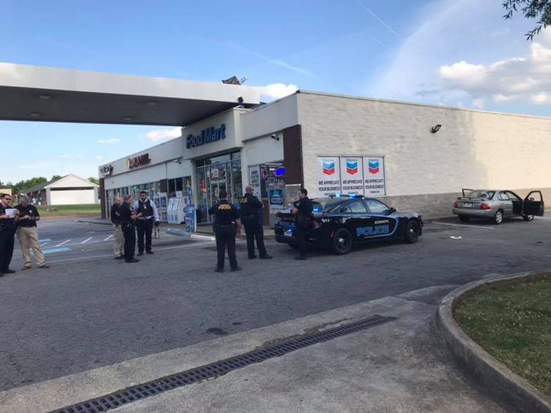 Acworth police have arrested four suspects in connection with a  Baker Road gas station shooting that left one man seriously injured Sunday.