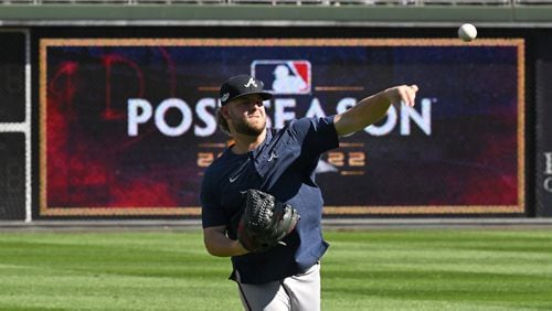 Braves pitcher A.J. Minter throws a ball before Game 4 of the 2022 National League Division Series Championship at Citizens Bank Park in Philadelphia on Saturday, October 15, 2022. (Hyosub Shin / Hyosub.Shin@ajc.com)