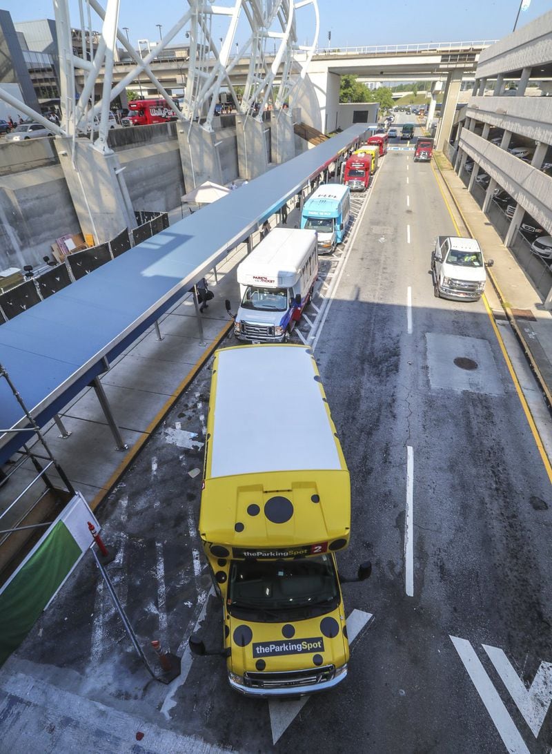 Aug 12, 2019 Hartsfield-Jackson International Airport : The worldâ€™s busiest airport moved off-airport parking shuttle pick-ups at the domestic terminal to the Terminal North lower level on Monday Aug. 12. Previously, those shuttles line up in designated spaces along an aisle of the ground transportation center outside the airportâ€™s west exit door. But there are major construction projects planned in that area, include an extension of the Plane Train tunnel and improvements to the West curb area. Monday, airport officials advised passengers taking off-airport parking shuttles to go to Terminal North escalators down to the lower level and exit through door LN1. Airport officials say signs and customer service representatives in bright green jackets will direct passengers. There will be no change for shuttle drop-offs, which will continue to be at the outer curb on the upper level of Terminal North. Regional shared-ride shuttle pick-ups will also be relocated effective Monday Aug. 12. The regional shared-ride shuttle pick-up area will take the place of the off-airport parking shuttles, behind the hotel shuttle aisle. Airport officials plan to later announce more changes for shuttle locations this fall. JOHN SPINK/JSPINK@AJC.COM