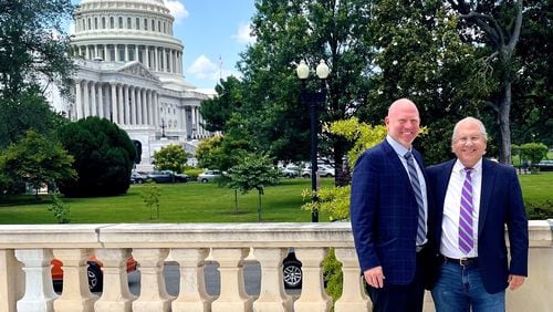 Former UGA football special teams coordinator Scott Cochran, left, and former Georgia Council for Recovery official Jeff Breedlove pose for a photo at Capitol Hill on their first trip to Washington, D.C. to launch their addiction recovery organization.  Photo courtesy of Jeff Breedlove