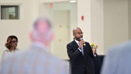 John Pace III meets parents, officials and district employees of Henry County Schools at an icebreaker Monday at McDonough High School. The school board of the south metro Atlanta school system unanimously approved Pace as the district's new superintendent on Tuesday.